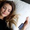 A Woman Sleeping on Aslan Adjustable Pillow Set